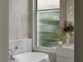 Patterned glass design detail for privacy and style